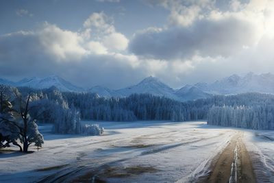 Scenic view of snowcapped mountains against sky