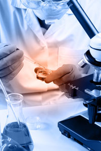 Close-up of scientist working at laboratory