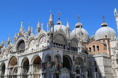 Low angle view of building against blue sky