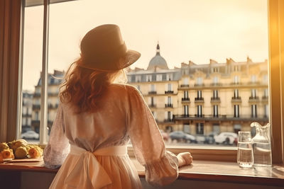 Rear view of woman looking away