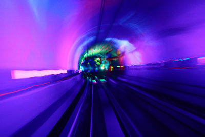 Light trails on illuminated tunnel