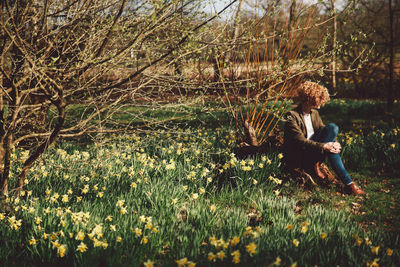 Woman standing on grass