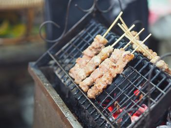 Close-up of meat on barbecue grill