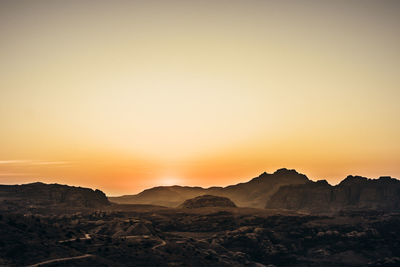 Scenic view of mountains against sky during sunset