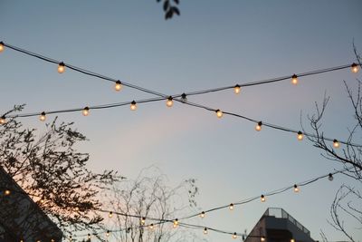 Low angle view of cables against sky