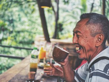 Portrait of a man drinking beer glass