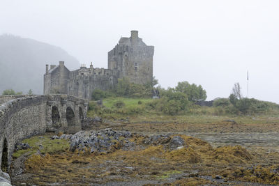 Old ruin building against clear sky