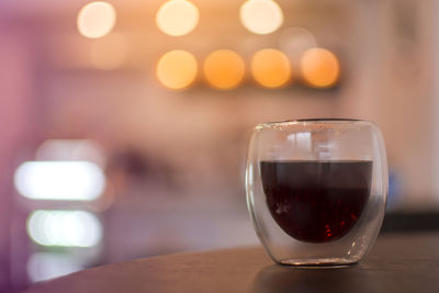 Close-up of beer glass on table