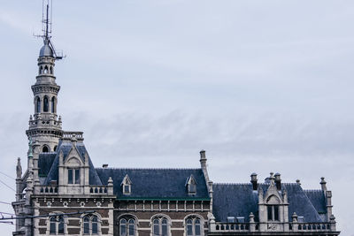 Buildings in city against sky