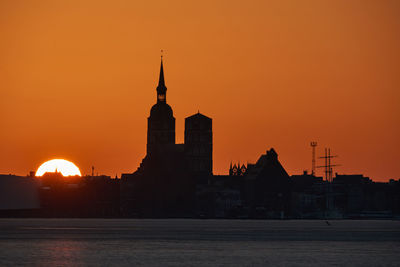 Silhouette of city of stralsund with sunset