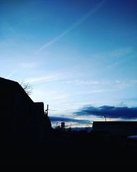 Low angle view of building against blue sky