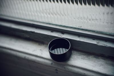 High angle view of glass window on table