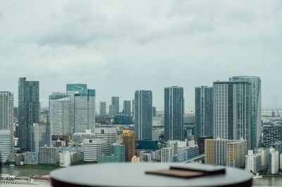 Modern cityscape against sky