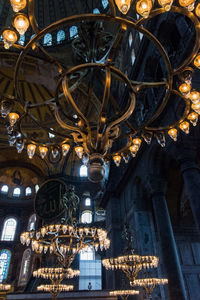 Low angle view of illuminated ceiling of building