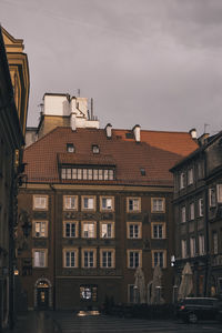 Buildings in city against sky