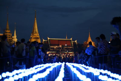 Group of people in temple against building