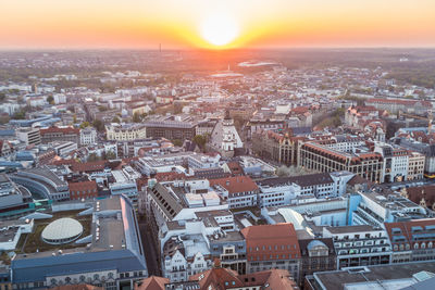 High angle view of townscape against sky during sunset