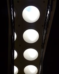 Low angle view of illuminated lamp