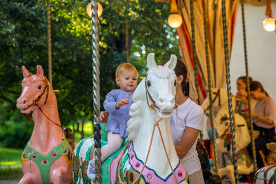 Siblings in amusement park