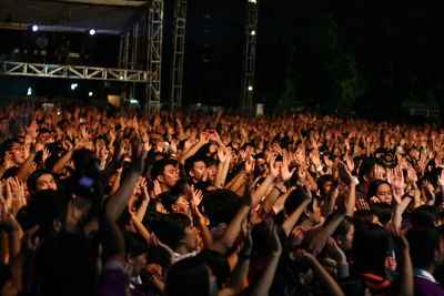 People enjoying at concert