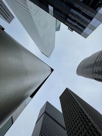 Low angle view of modern buildings against sky