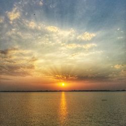 Scenic view of sunset over sea