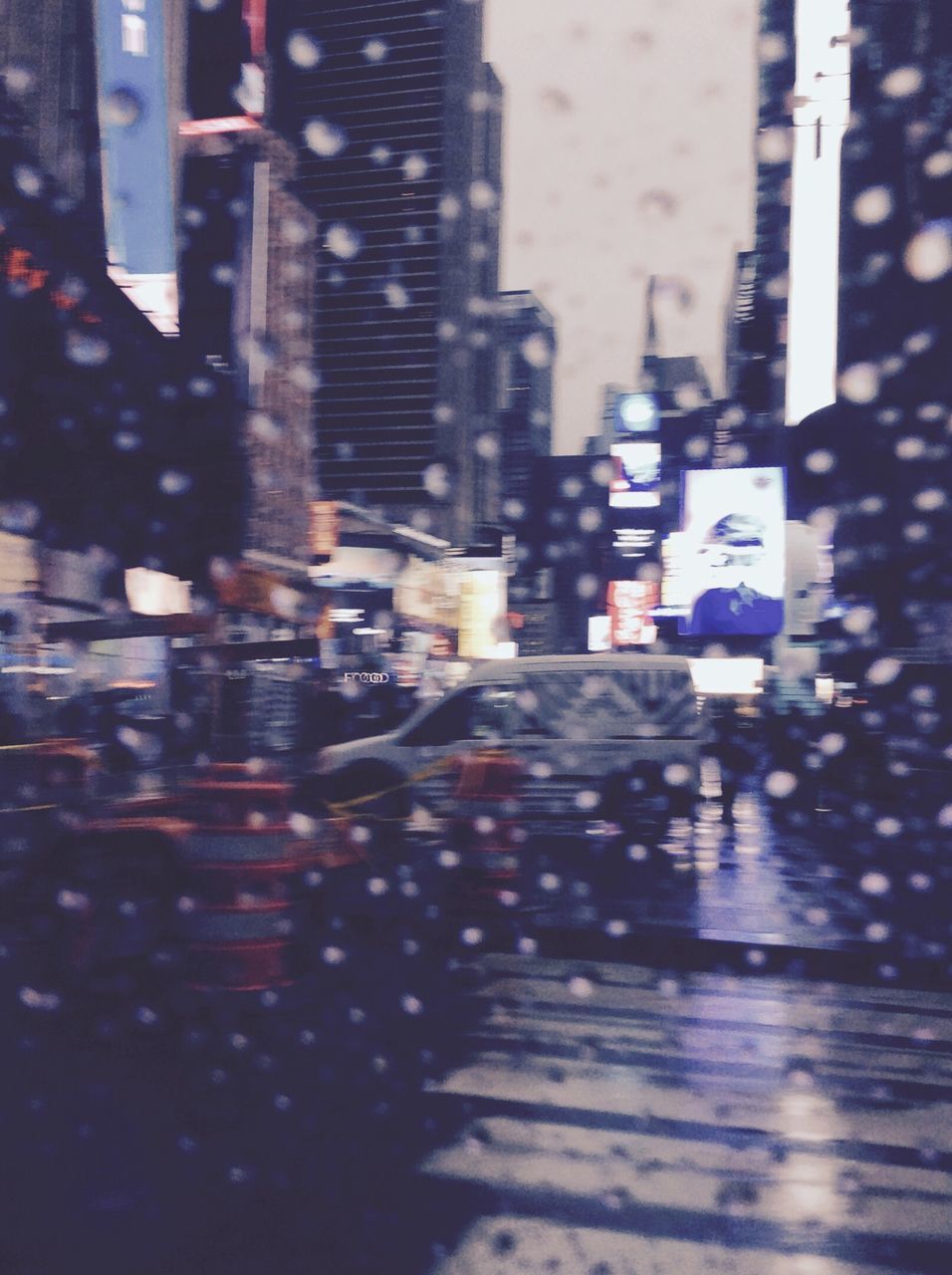 FULL FRAME SHOT OF WET CITY STREET