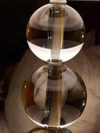 Close-up of clock on table