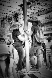 Low angle view of women dancing at music concert