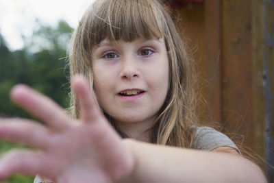 Portrait of cute girl gesturing 