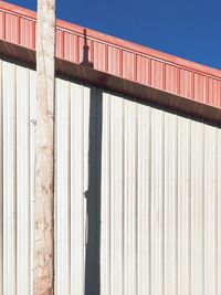 Metallic structure against sky