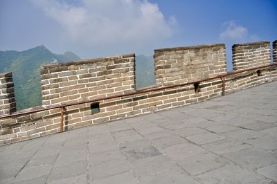 View of buildings against cloudy sky