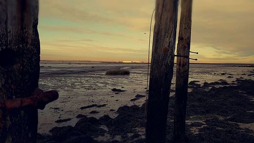 Scenic view of sea against sky at sunset