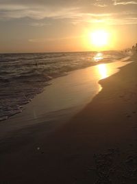 Scenic view of sea at sunset