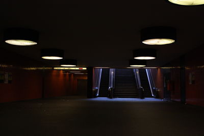 Empty illuminated building at night
