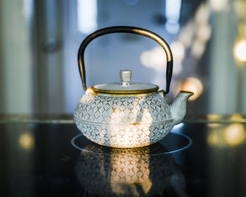 Close-up of tea cup on table