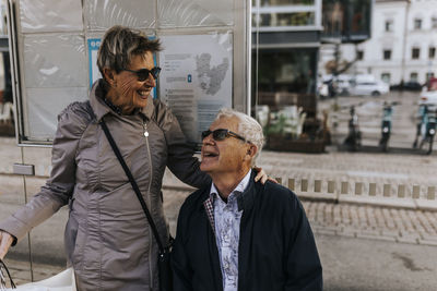 Senior couple waiting at bus stop