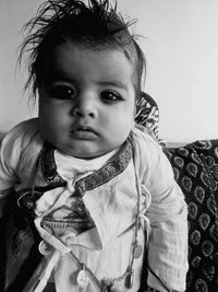 Portrait of cute baby at home