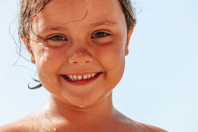 Portrait of girl smiling outdoors