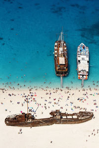High angle view of boats moored on seas