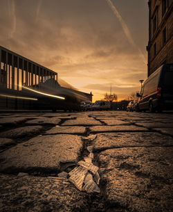 Bridge over river against sky during sunset