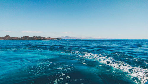 Scenic view of sea against clear sky