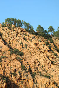 Scenic view of rocky mountains against clear sky