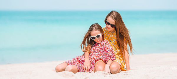 Woman wearing sunglasses on beach