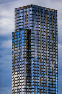 Low angle view of modern buildings against sky