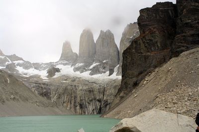 Scenic view of mountain against cloudy sky