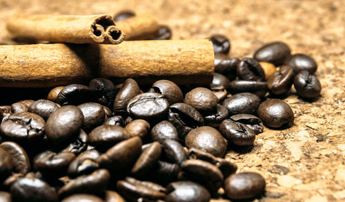 Close-up of coffee beans on table