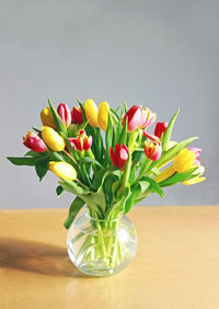 Close-up of tulips in vase on table