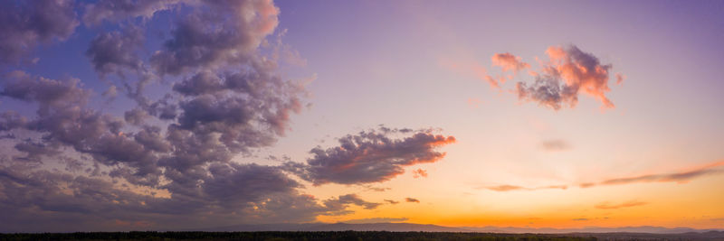 Low angle view of dramatic sky during sunset