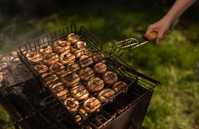 Cropped hand of man preparing food